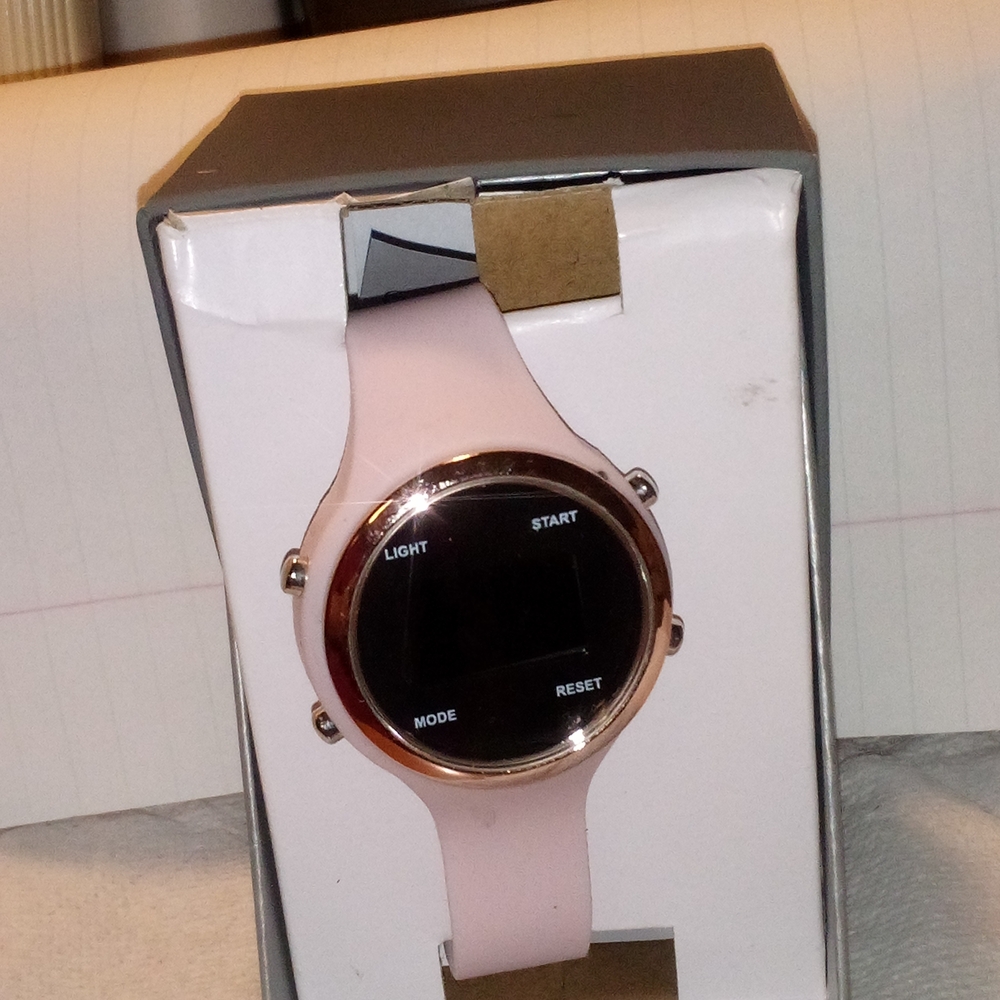 Sleek Pink Smartwatch with Round Display and Silicone Band